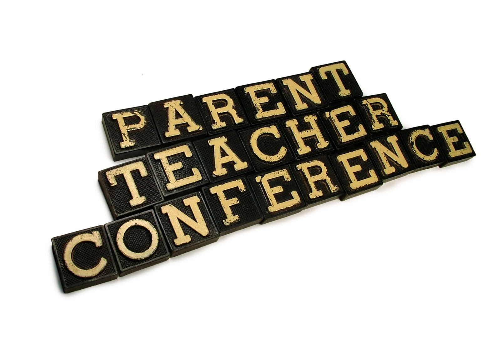 Letter tiles that spell out parent teacher conference