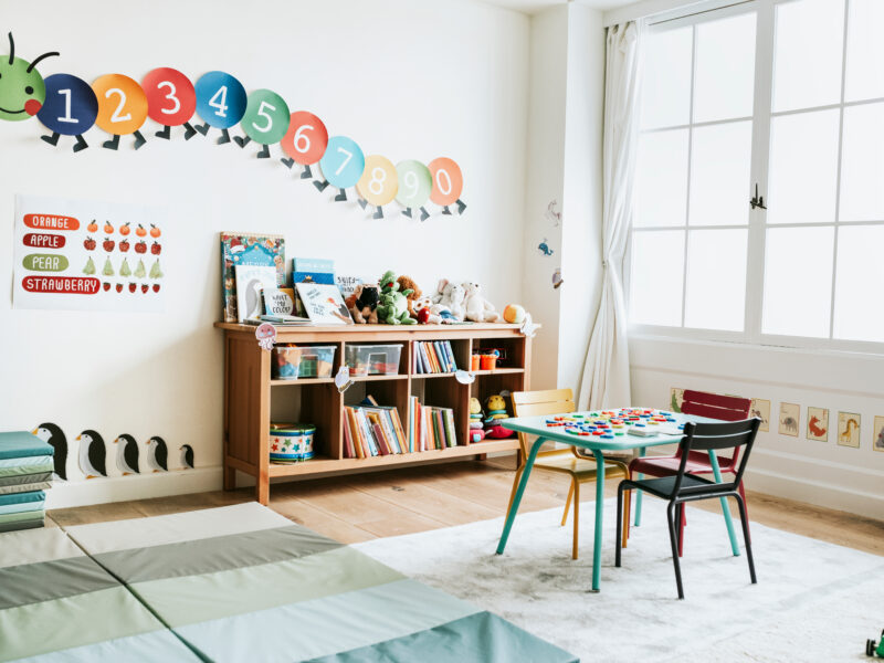 cute preschool classroom with alphabet caterpillar on the wall