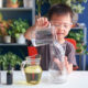 Little boy doing a science experiment